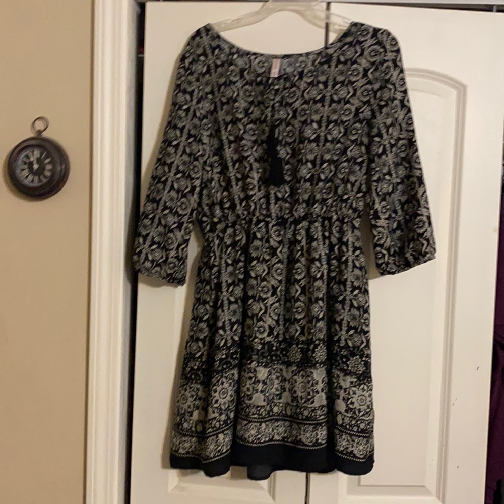 3/4 length sleeve black dress with white flower pattern tie at Neck